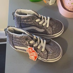 Brand new pair of toddler vans with tags and box. Sz 6 (glitter) silver